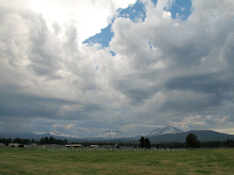 storm clouds above the Three Sisters [Highway 242, Sisters, Deschutes County, Oregon]
