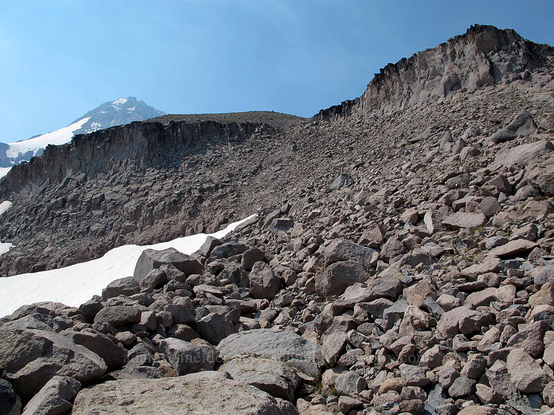 cliffs above the west side of the glacier [Eliot Glacier moraine, Mt. Hood Wilderness, Hood River County, Oregon]
