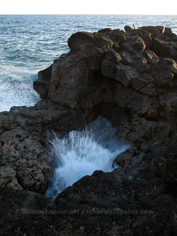 hole in the bench [Ho'one Road, Po'ipu, Kaua'i, Hawaii]