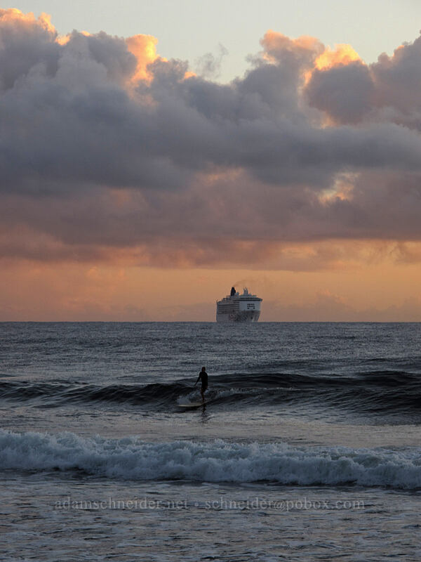 surfer and cruise ship at sunrise [Honoli'i Beach Park, Pauka'a, Big Island, Hawaii]