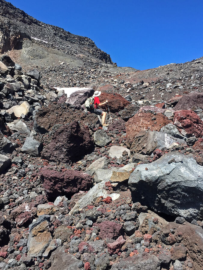 Adam & volcanic rubble [north of Hayden Glacier, Three Sisters Wilderness, Deschutes County, Oregon]
