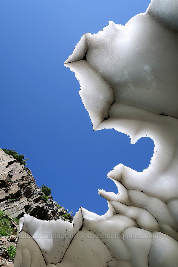 melting snow bridge [above Leigh Lake, Cabinet Mountains Wilderness, Lincoln County, Montana]