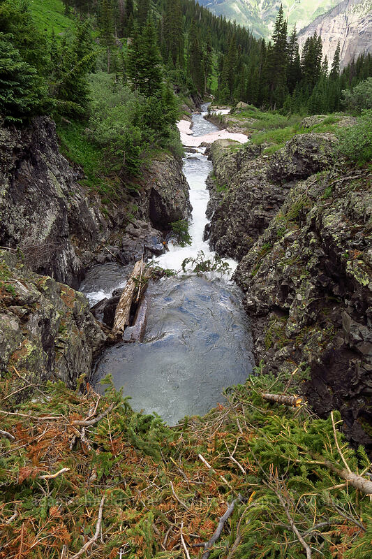 Bridal Veil creek emerging from under an avalanche [Bridal Veil Trail, Uncompaghre National Forest, San Miguel County, Colorado]